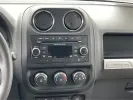 2014 Bright White Clearcoat Jeep Compass Sport FWD (1C4NJCBA9ED) with an 2.0L L4 DOHC 16V engine, located at 880 E. National Road, Vandalia, OH, 45377, (937) 908-9800, 39.891918, -84.183594 - 2014 Jeep Compass Sport FWD - Photo#11