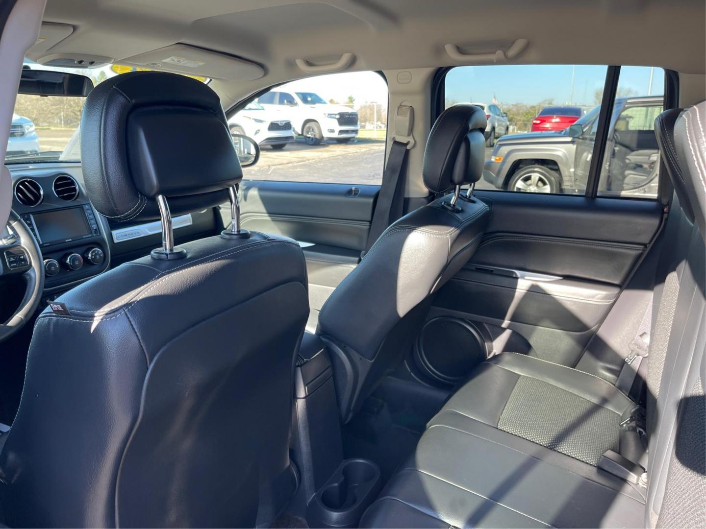 2014 Jeep Compass Latitude (1C4NJDEB7ED) with an Other engine, located at 8750 N County Rd 25A, Piqua, OH, 45356, (937) 908-9800, 40.164391, -84.232513 - 2014 Jeep Compass Latitude - Photo#9