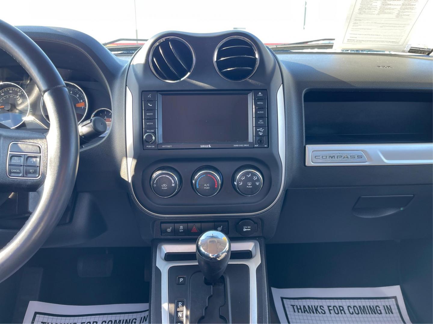 2014 Jeep Compass Latitude (1C4NJDEB7ED) with an Other engine, located at 8750 N County Rd 25A, Piqua, OH, 45356, (937) 908-9800, 40.164391, -84.232513 - 2014 Jeep Compass Latitude - Photo#12