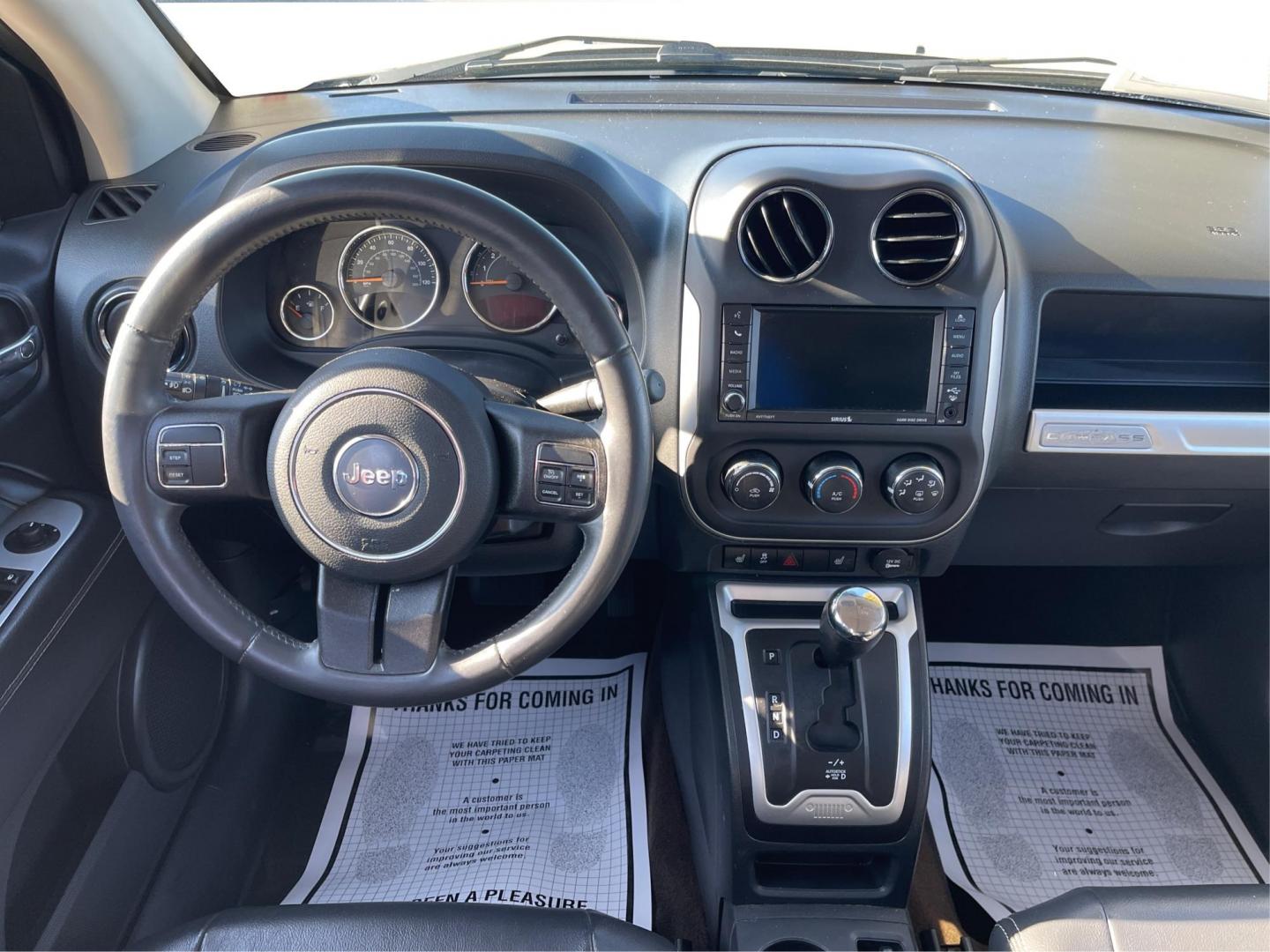 2014 Jeep Compass Latitude (1C4NJDEB7ED) with an Other engine, located at 8750 N County Rd 25A, Piqua, OH, 45356, (937) 908-9800, 40.164391, -84.232513 - 2014 Jeep Compass Latitude - Photo#19