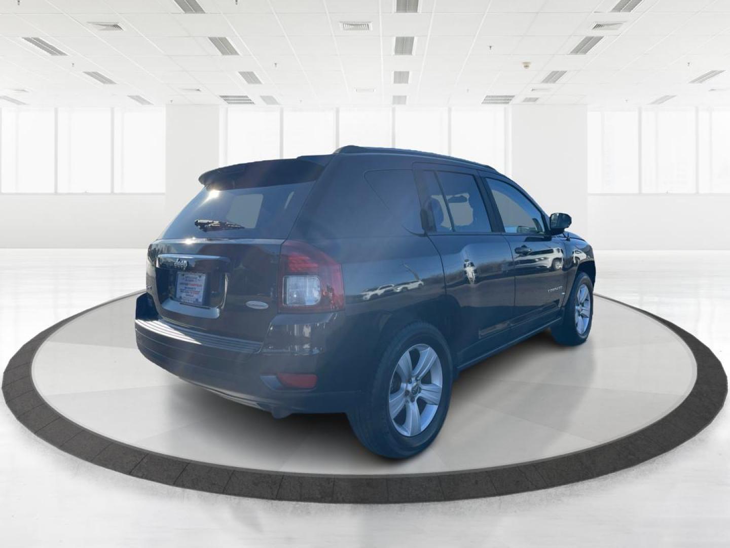 2014 Jeep Compass Latitude (1C4NJDEB7ED) with an Other engine, located at 8750 N County Rd 25A, Piqua, OH, 45356, (937) 908-9800, 40.164391, -84.232513 - 2014 Jeep Compass Latitude - Photo#2