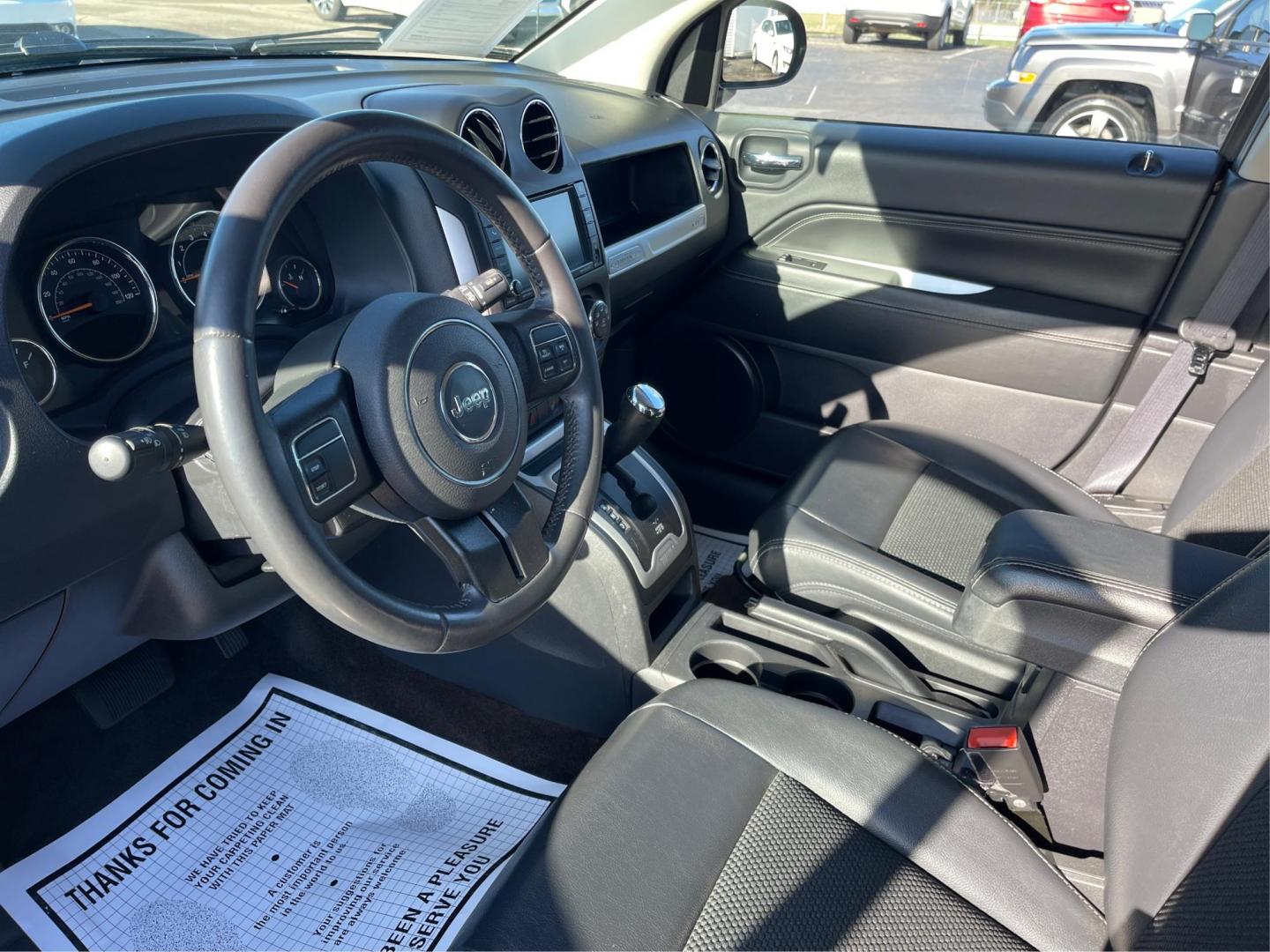 2014 Jeep Compass Latitude (1C4NJDEB7ED) with an Other engine, located at 8750 N County Rd 25A, Piqua, OH, 45356, (937) 908-9800, 40.164391, -84.232513 - 2014 Jeep Compass Latitude - Photo#8
