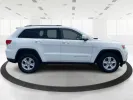 2014 Jeep Grand Cherokee Laredo (1C4RJFAGXEC) with an 3.6L V-6 DOHC engine, located at 880 E. National Road, Vandalia, OH, 45377, (937) 908-9800, 39.891918, -84.183594 - 2014 Jeep Grand Cherokee Laredo - Photo#1