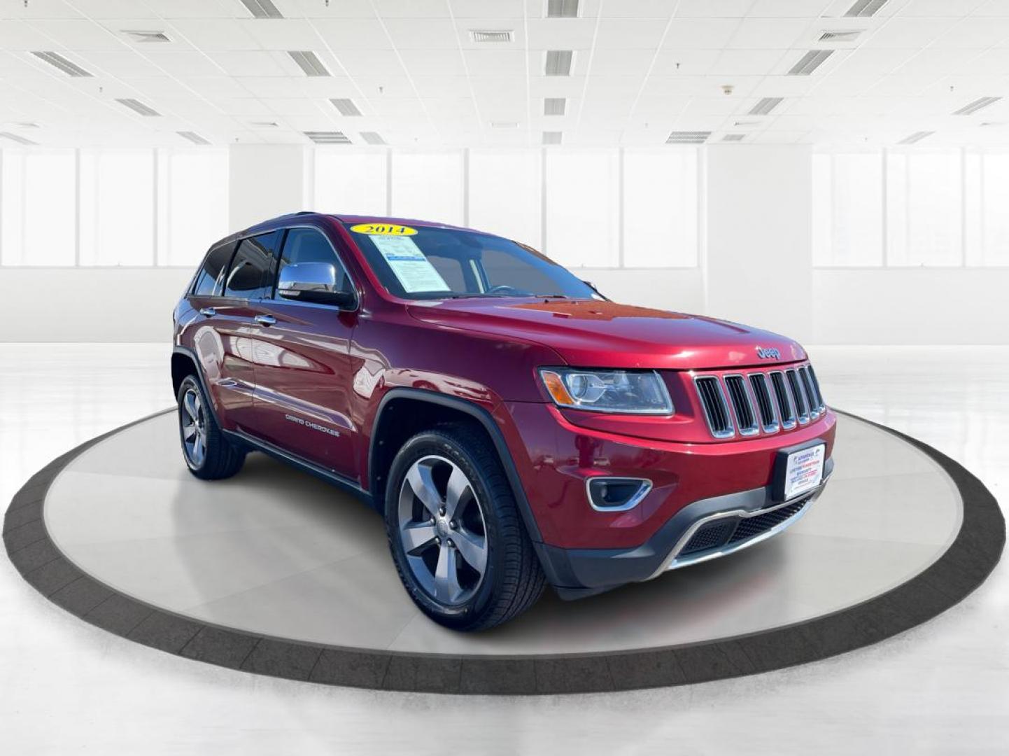 2014 Jeep Grand Cherokee Limited (1C4RJFBG5EC) with an 3.6L V-6 DOHC engine, located at 880 E. National Road, Vandalia, OH, 45377, (937) 908-9800, 39.891918, -84.183594 - 2014 Jeep Grand Cherokee Limited - Photo#0