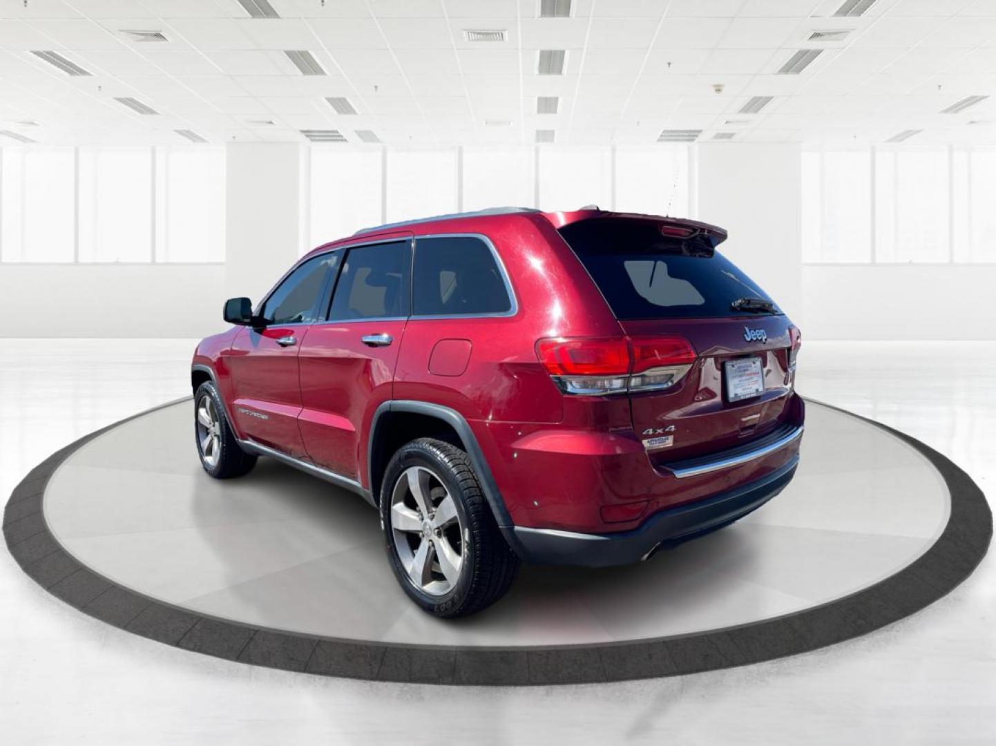 2014 Jeep Grand Cherokee Limited (1C4RJFBG5EC) with an 3.6L V-6 DOHC engine, located at 880 E. National Road, Vandalia, OH, 45377, (937) 908-9800, 39.891918, -84.183594 - 2014 Jeep Grand Cherokee Limited - Photo#4