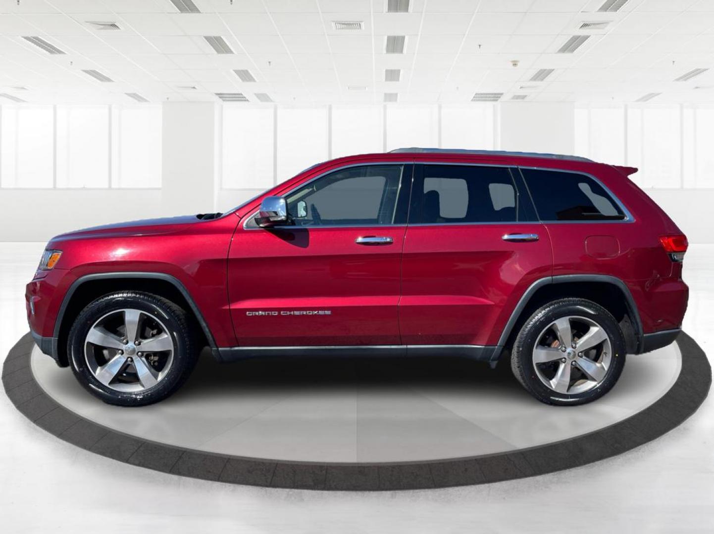 2014 Jeep Grand Cherokee Limited (1C4RJFBG5EC) with an 3.6L V-6 DOHC engine, located at 880 E. National Road, Vandalia, OH, 45377, (937) 908-9800, 39.891918, -84.183594 - 2014 Jeep Grand Cherokee Limited - Photo#5