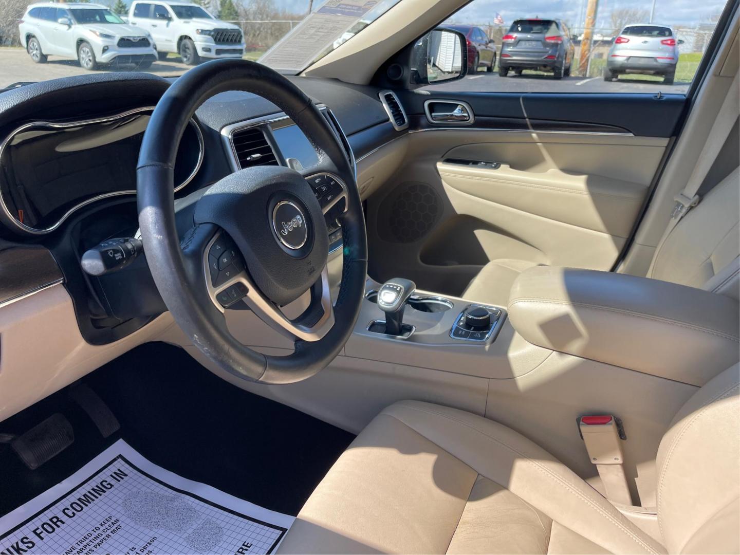 2014 Jeep Grand Cherokee Limited (1C4RJFBG5EC) with an 3.6L V-6 DOHC engine, located at 880 E. National Road, Vandalia, OH, 45377, (937) 908-9800, 39.891918, -84.183594 - 2014 Jeep Grand Cherokee Limited - Photo#8