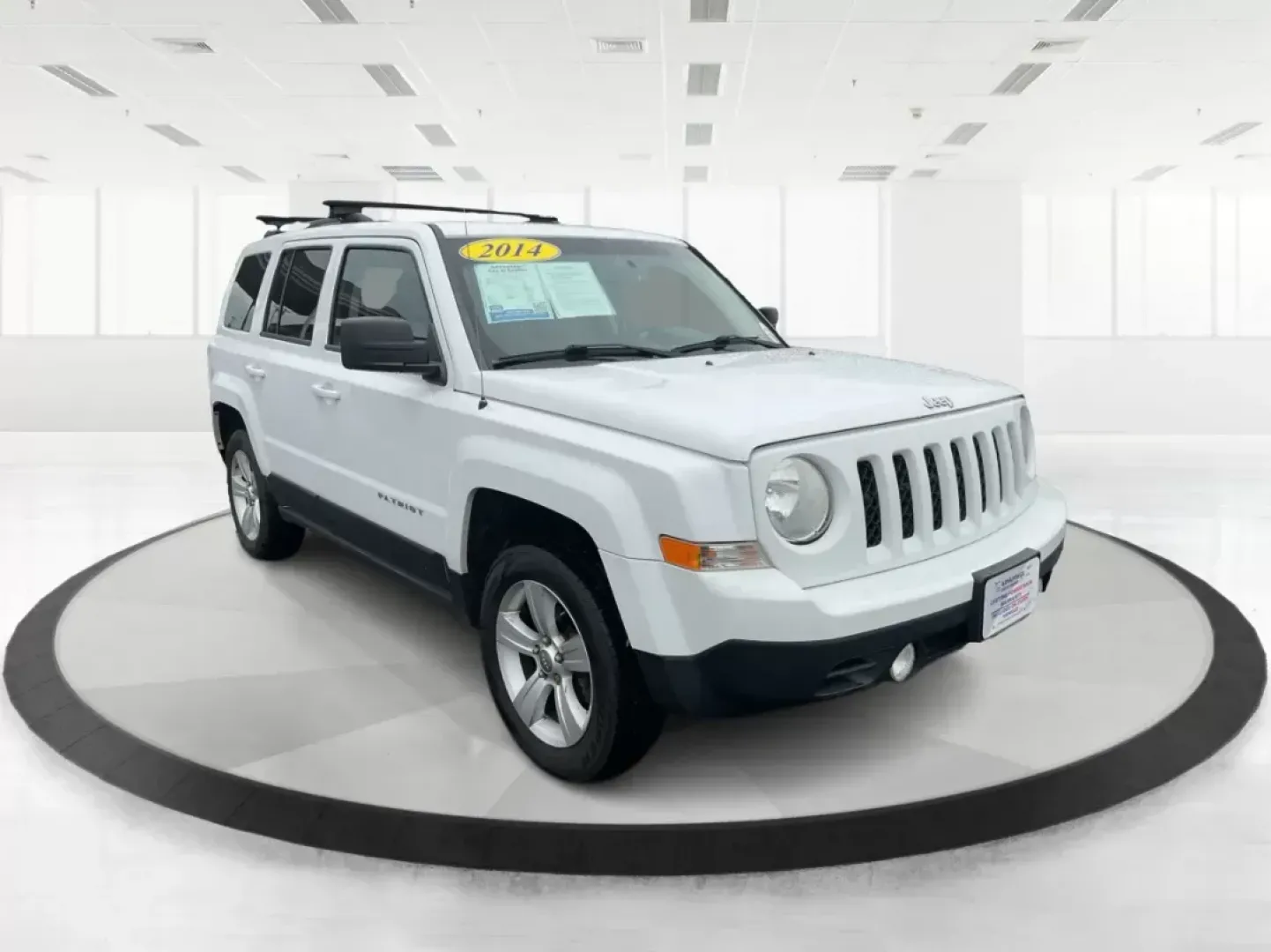 2014 Jeep Patriot Latitude (1C4NJRFB4ED) with an 2.4L I-4 DOHC engine, located at 1230 East Main St, Xenia, OH, 45385, (937) 908-9800, 39.688026, -83.910172 - 2014 Jeep Patriot Latitude - Photo#0