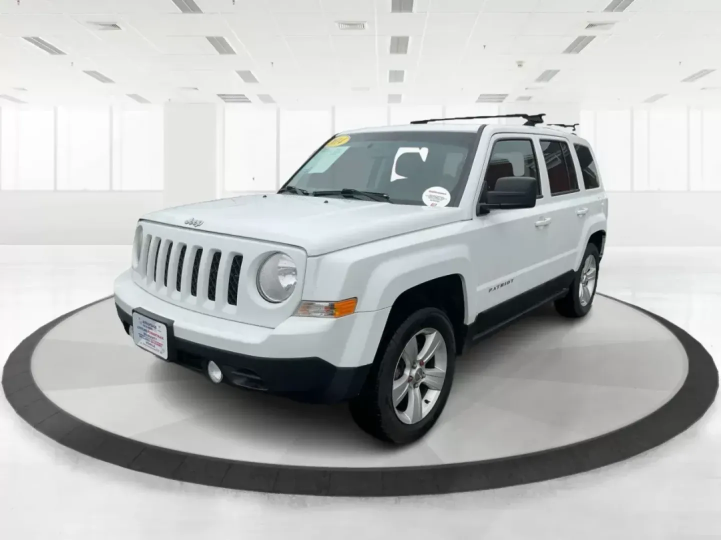 2014 Jeep Patriot Latitude (1C4NJRFB4ED) with an 2.4L I-4 DOHC engine, located at 1230 East Main St, Xenia, OH, 45385, (937) 908-9800, 39.688026, -83.910172 - 2014 Jeep Patriot Latitude - Photo#7
