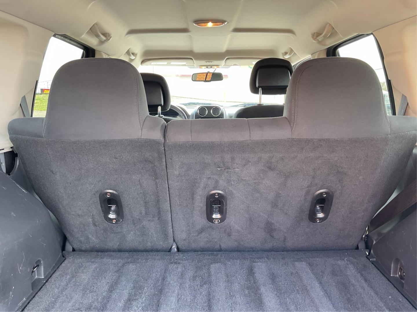 2014 Bright Silver Metallic CC Jeep Patriot Latitude 2WD (1C4NJPFA5ED) with an 2.0L L4 DOHC 16V engine, located at 880 E. National Road, Vandalia, OH, 45377, (937) 908-9800, 39.891918, -84.183594 - 2014 Jeep Patriot Latitude 2WD - Photo#9