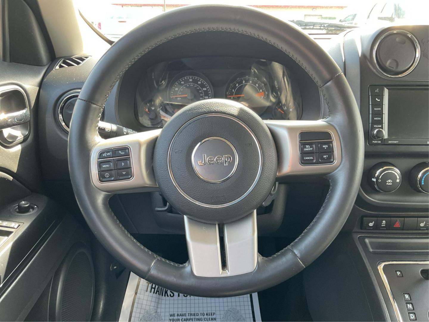 2014 Bright Silver Metallic CC Jeep Patriot Latitude 2WD (1C4NJPFA5ED) with an 2.0L L4 DOHC 16V engine, located at 880 E. National Road, Vandalia, OH, 45377, (937) 908-9800, 39.891918, -84.183594 - 2014 Jeep Patriot Latitude 2WD - Photo#13