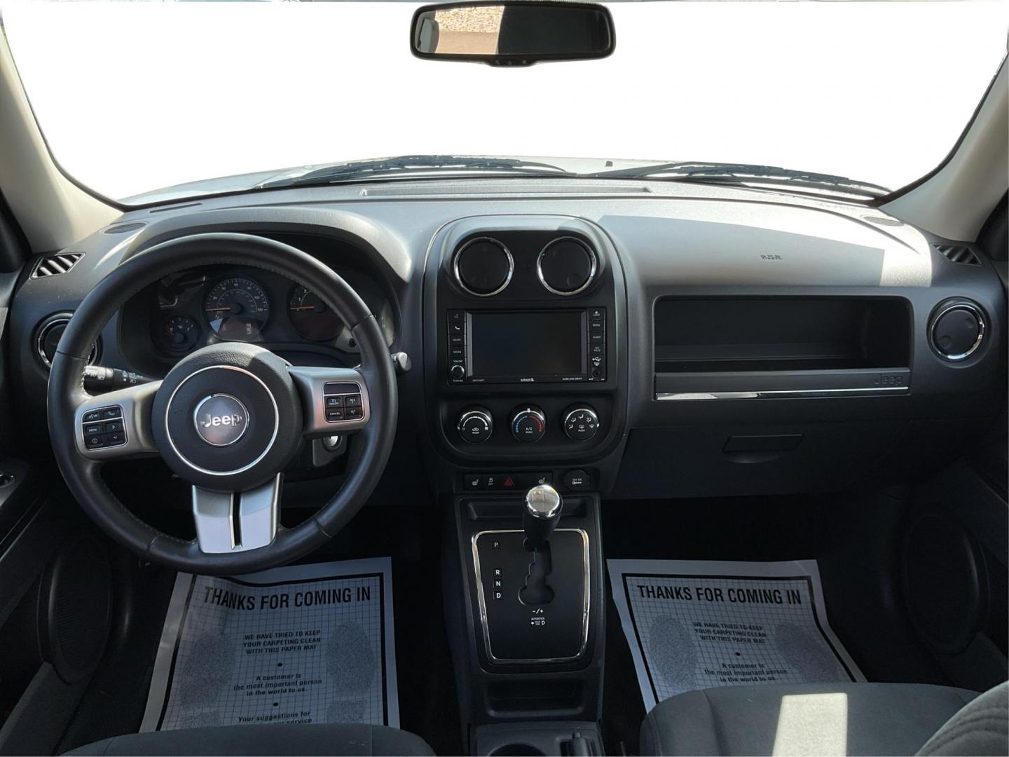 2014 Bright Silver Metallic CC Jeep Patriot Latitude 2WD (1C4NJPFA5ED) with an 2.0L L4 DOHC 16V engine, located at 880 E. National Road, Vandalia, OH, 45377, (937) 908-9800, 39.891918, -84.183594 - 2014 Jeep Patriot Latitude 2WD - Photo#16