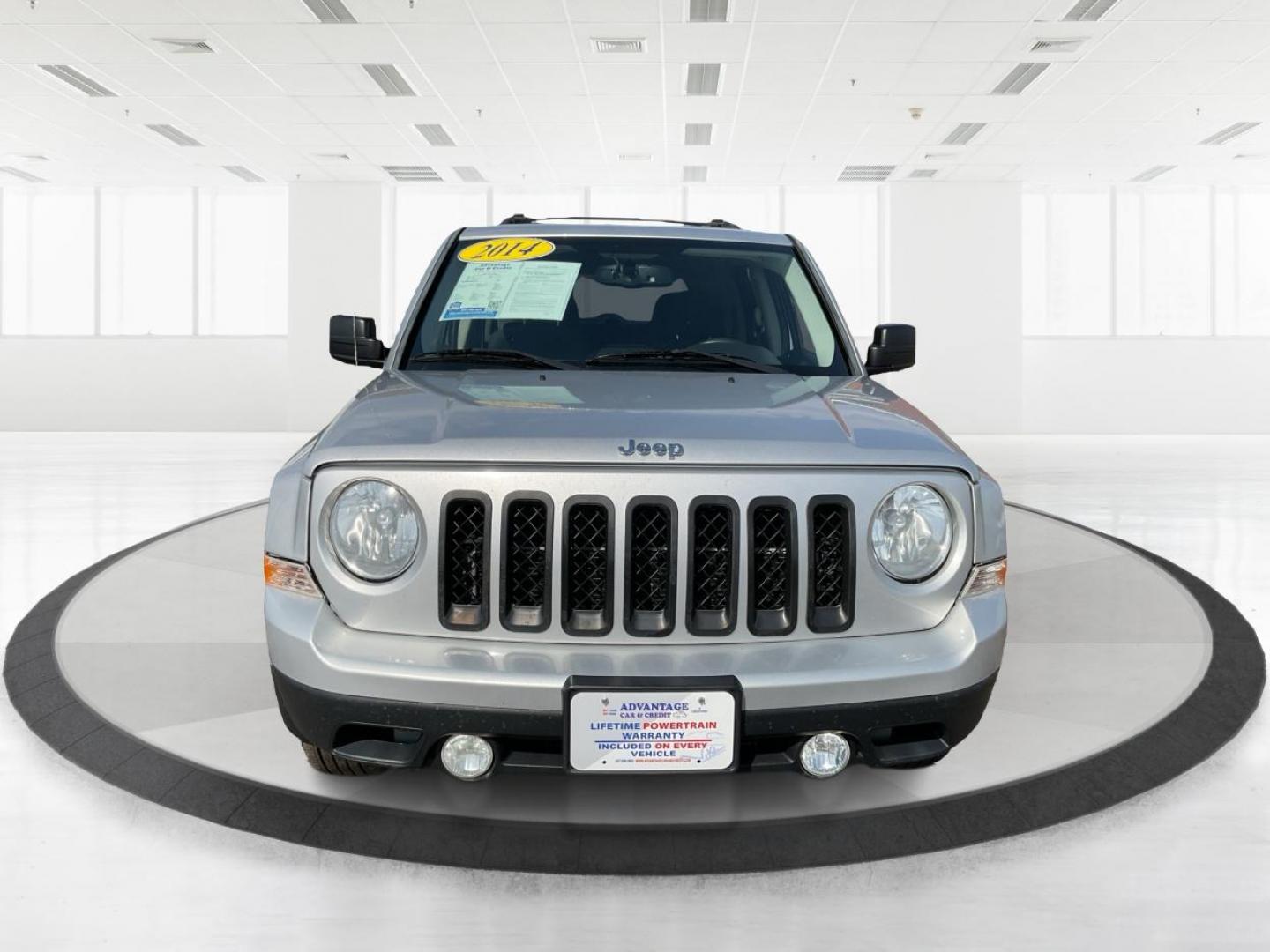 2014 Bright Silver Metallic CC Jeep Patriot Latitude 2WD (1C4NJPFA5ED) with an 2.0L L4 DOHC 16V engine, located at 880 E. National Road, Vandalia, OH, 45377, (937) 908-9800, 39.891918, -84.183594 - 2014 Jeep Patriot Latitude 2WD - Photo#4