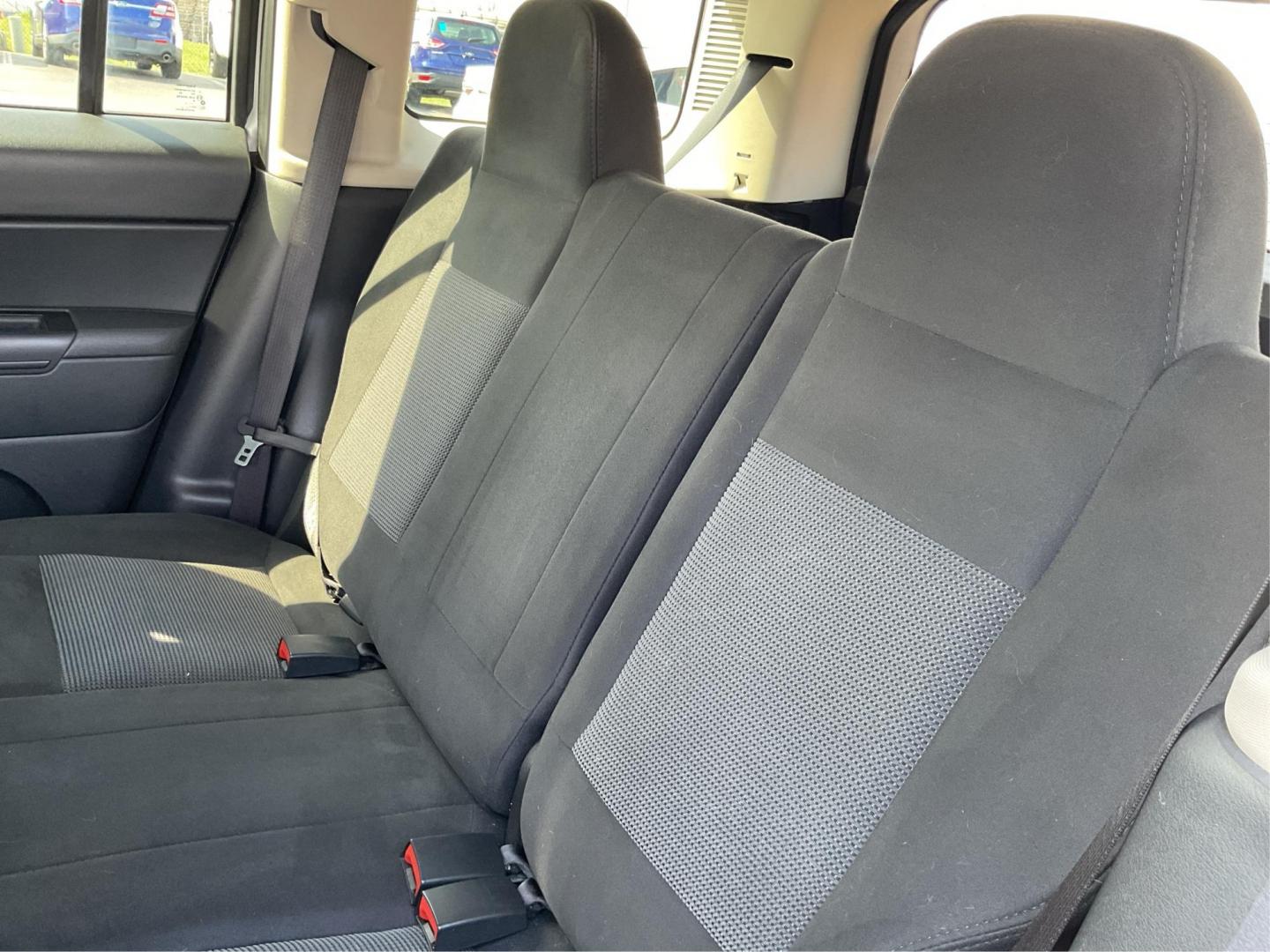 2014 Bright Silver Metallic CC Jeep Patriot Latitude 2WD (1C4NJPFA5ED) with an 2.0L L4 DOHC 16V engine, located at 880 E. National Road, Vandalia, OH, 45377, (937) 908-9800, 39.891918, -84.183594 - 2014 Jeep Patriot Latitude 2WD - Photo#7