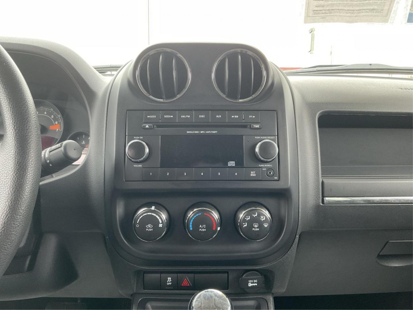 2014 Jeep Patriot Sport (1C4NJRBB0ED) with an Other engine, located at 1099 N County Rd 25A , Troy, OH, 45373, (937) 908-9800, 40.057079, -84.212883 - 2014 Jeep Patriot Sport - Photo#12