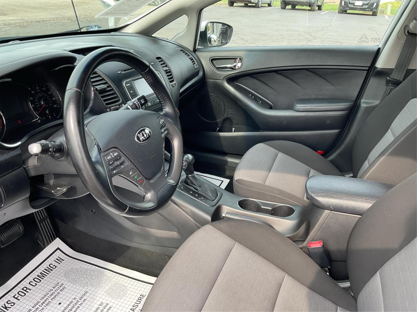 2014 Kia Forte EX (KNAFX4A81E5) with an 2L I-4 gasoline direct injection engine, located at 1099 N County Rd 25A , Troy, OH, 45373, (937) 908-9800, 40.057079, -84.212883 - 2014 Kia Forte EX - Photo#9