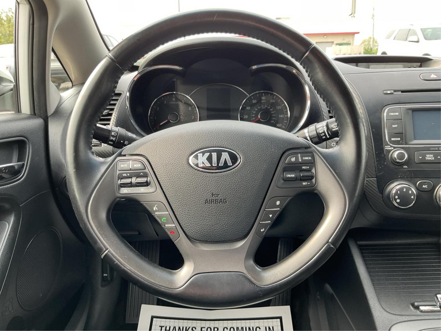 2014 Kia Forte EX (KNAFX4A81E5) with an 2L I-4 gasoline direct injection engine, located at 1099 N County Rd 25A , Troy, OH, 45373, (937) 908-9800, 40.057079, -84.212883 - 2014 Kia Forte EX - Photo#16