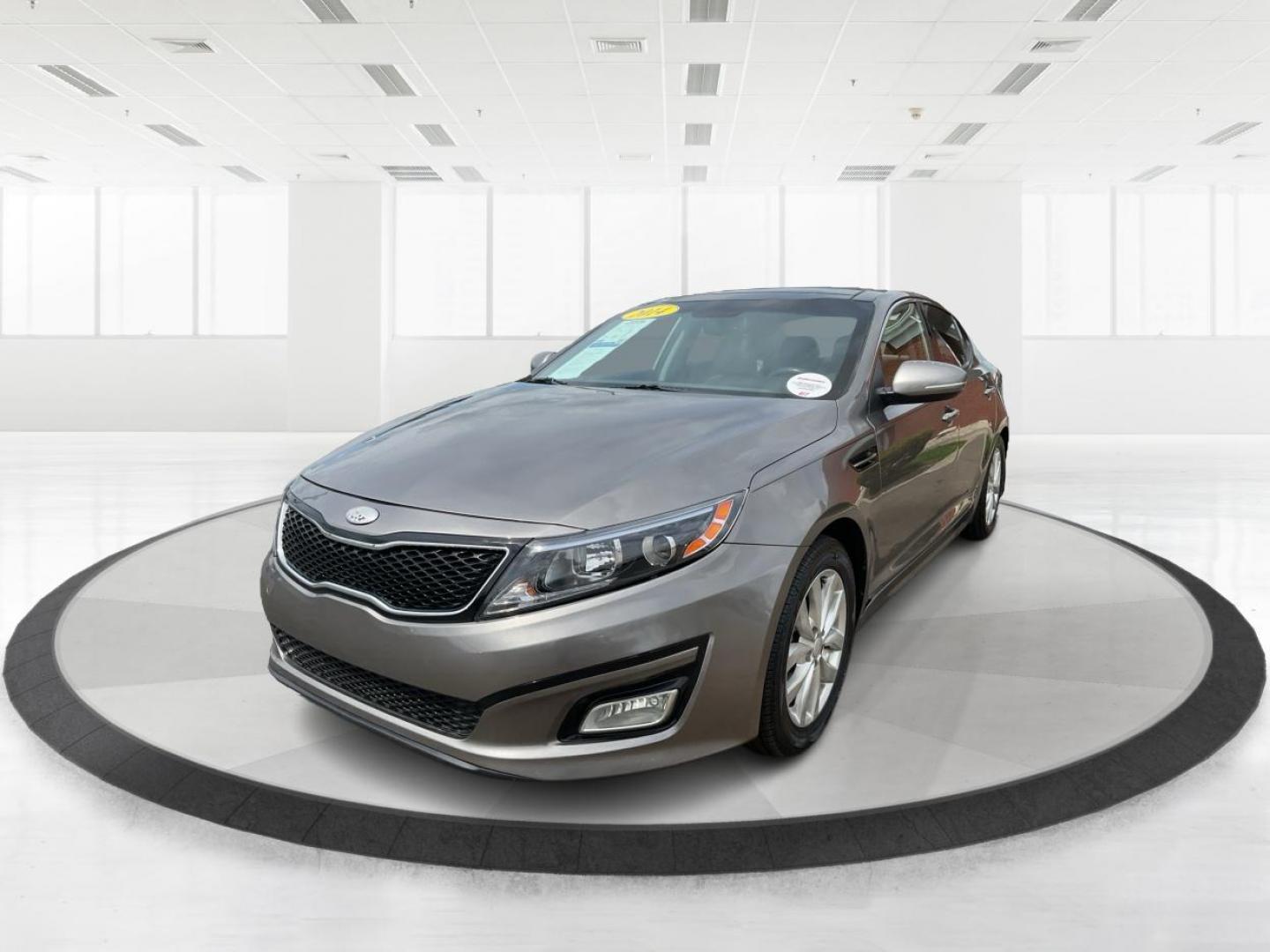 2014 Kia Optima EX (5XXGN4A76EG) with an Theta II 2.4L I-4 gasoline direct injection engine, located at 1184 Kauffman Ave, Fairborn, OH, 45324, (937) 908-9800, 39.807072, -84.030914 - 2014 Kia Optima EX - Photo#7