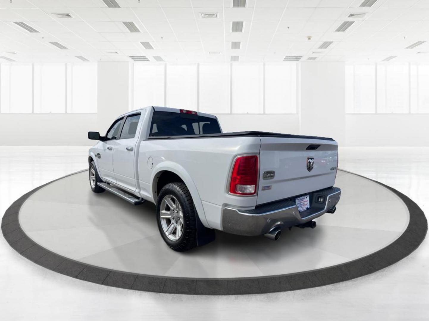 2014 Ram 1500 Longhorn (1C6RR7WT2ES) with an HEMI engine, located at 4508 South Dixie Dr, Moraine, OH, 45439, (937) 908-9800, 39.689976, -84.218452 - 2014 Ram 1500 Longhorn - Photo#4