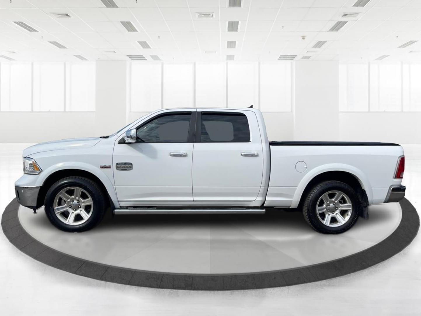 2014 Ram 1500 Longhorn (1C6RR7WT2ES) with an HEMI engine, located at 4508 South Dixie Dr, Moraine, OH, 45439, (937) 908-9800, 39.689976, -84.218452 - 2014 Ram 1500 Longhorn - Photo#5