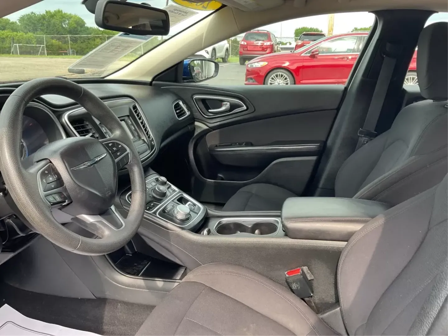 2015 Chrysler 200 Limited (1C3CCCAB1FN) with an Other engine, located at 880 E. National Road, Vandalia, OH, 45377, (937) 908-9800, 39.891918, -84.183594 - **Explore the Open Road with Comfort and Style in a 2015 Chrysler 200 Limited** <br /> <br /> Are you ready to elevate your daily commutes or weekend getaways? This 2015 Chrysler 200 Limited, available at Advantage Car and Credit in Fairborn, OH, is the perfect sedan for both city driving and long t - Photo#9