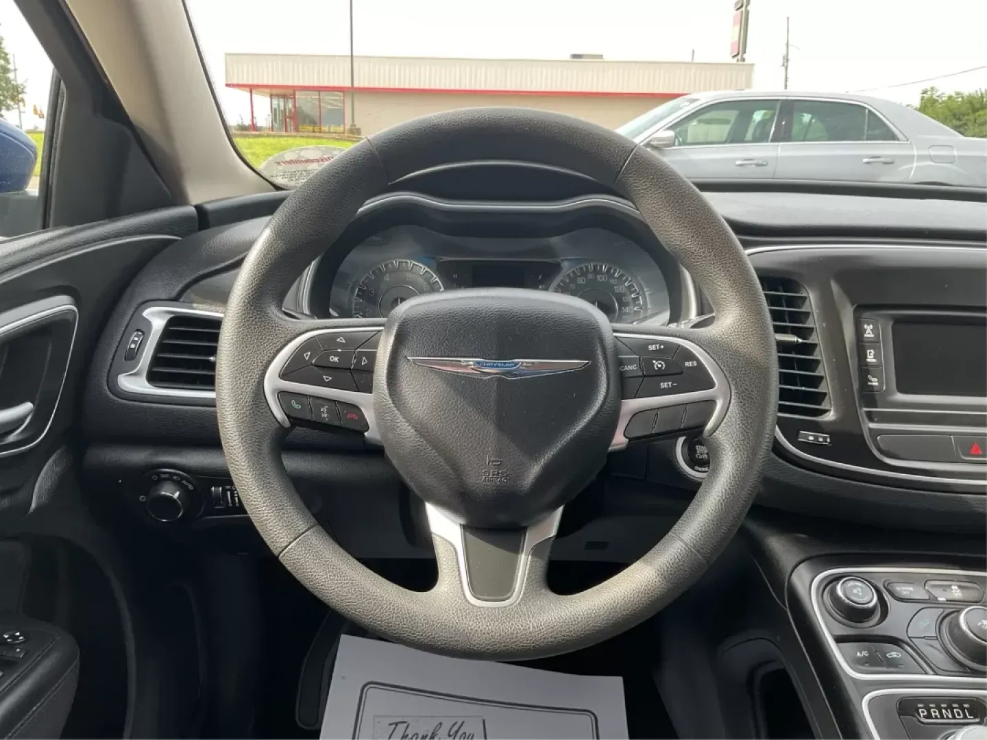 2015 Chrysler 200 Limited (1C3CCCAB1FN) with an Other engine, located at 880 E. National Road, Vandalia, OH, 45377, (937) 908-9800, 39.891918, -84.183594 - **Explore the Open Road with Comfort and Style in a 2015 Chrysler 200 Limited** <br /> <br /> Are you ready to elevate your daily commutes or weekend getaways? This 2015 Chrysler 200 Limited, available at Advantage Car and Credit in Fairborn, OH, is the perfect sedan for both city driving and long t - Photo#16