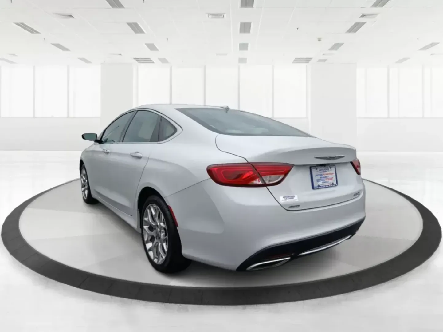 2015 Chrysler 200 C AWD (1C3CCCEG3FN) with an 3.6L V6 DOHC 24V FFV engine, 9-Speed Automatic transmission, located at 1184 Kauffman Ave, Fairborn, OH, 45324, (937) 908-9800, 39.807072, -84.030914 - 2015 Chrysler 200 C AWD - Photo#4