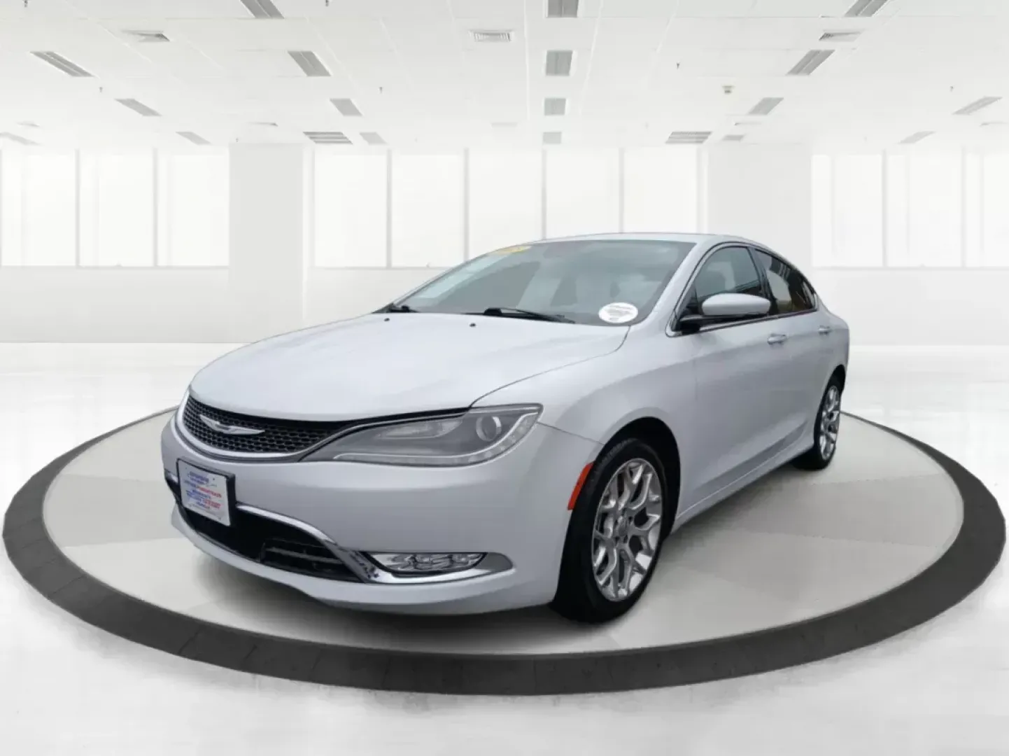 2015 Chrysler 200 C AWD (1C3CCCEG3FN) with an 3.6L V6 DOHC 24V FFV engine, 9-Speed Automatic transmission, located at 1184 Kauffman Ave, Fairborn, OH, 45324, (937) 908-9800, 39.807072, -84.030914 - 2015 Chrysler 200 C AWD - Photo#7