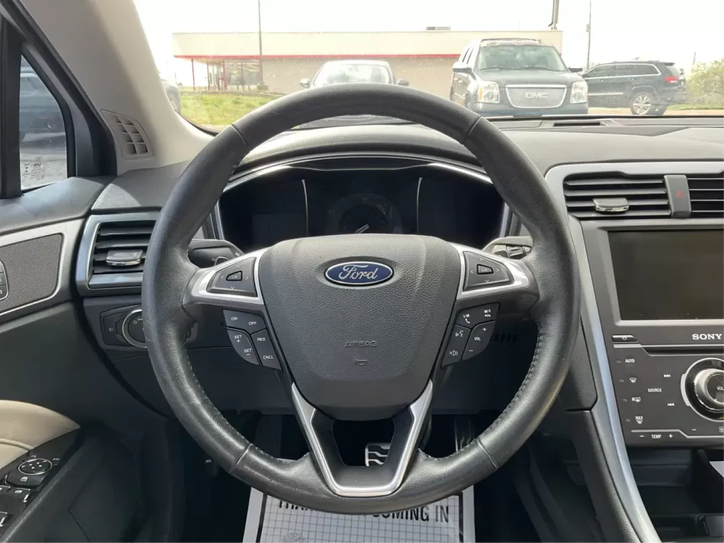 2015 Ford Fusion Titanium (3FA6P0K96FR) with an EcoBoost 2L I-4 gasoline direct injection engine, located at 401 Woodman Dr, Riverside, OH, 45431, (937) 908-9800, 39.760899, -84.123421 - 2015 Ford Fusion Titanium - Photo#16