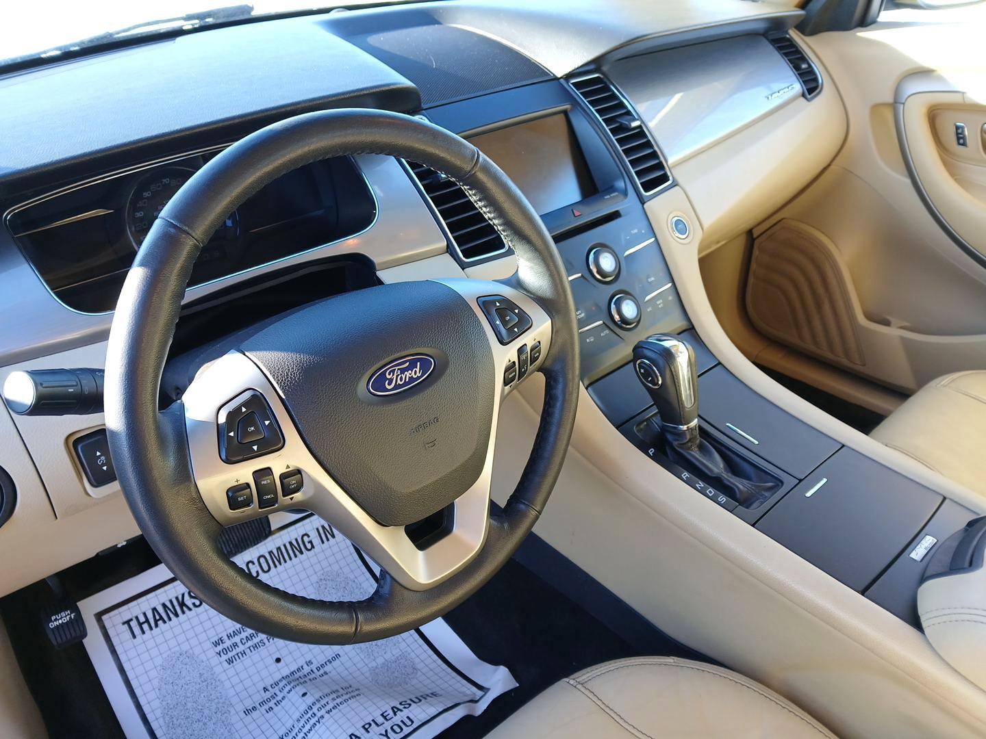 2015 Ford Taurus SEL (1FAHP2E87FG) with an 3.5L V6 DOHC 24V engine, located at 1099 N County Rd 25A , Troy, OH, 45373, (937) 908-9800, 40.057079, -84.212883 - 2015 Ford Taurus SEL - Photo#8
