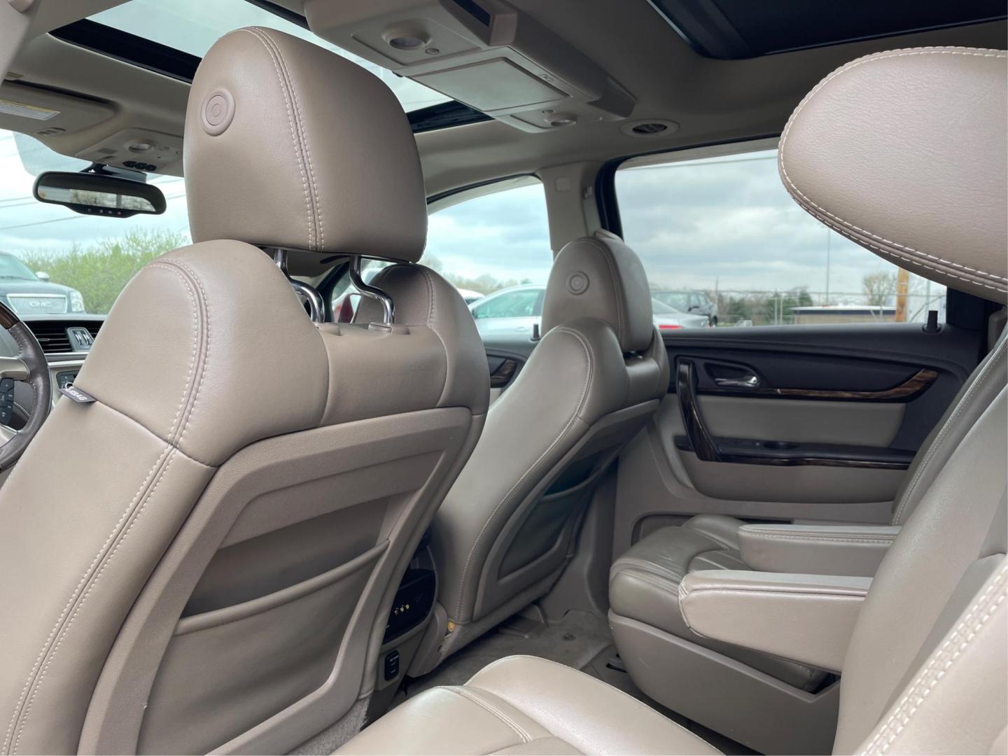 2015 GMC Acadia Denali (1GKKVTKD9FJ) with an 3.6L V-6 gasoline direct injection engine, located at 8750 N County Rd 25A, Piqua, OH, 45356, (937) 908-9800, 40.164391, -84.232513 - Third Row - Photo#9