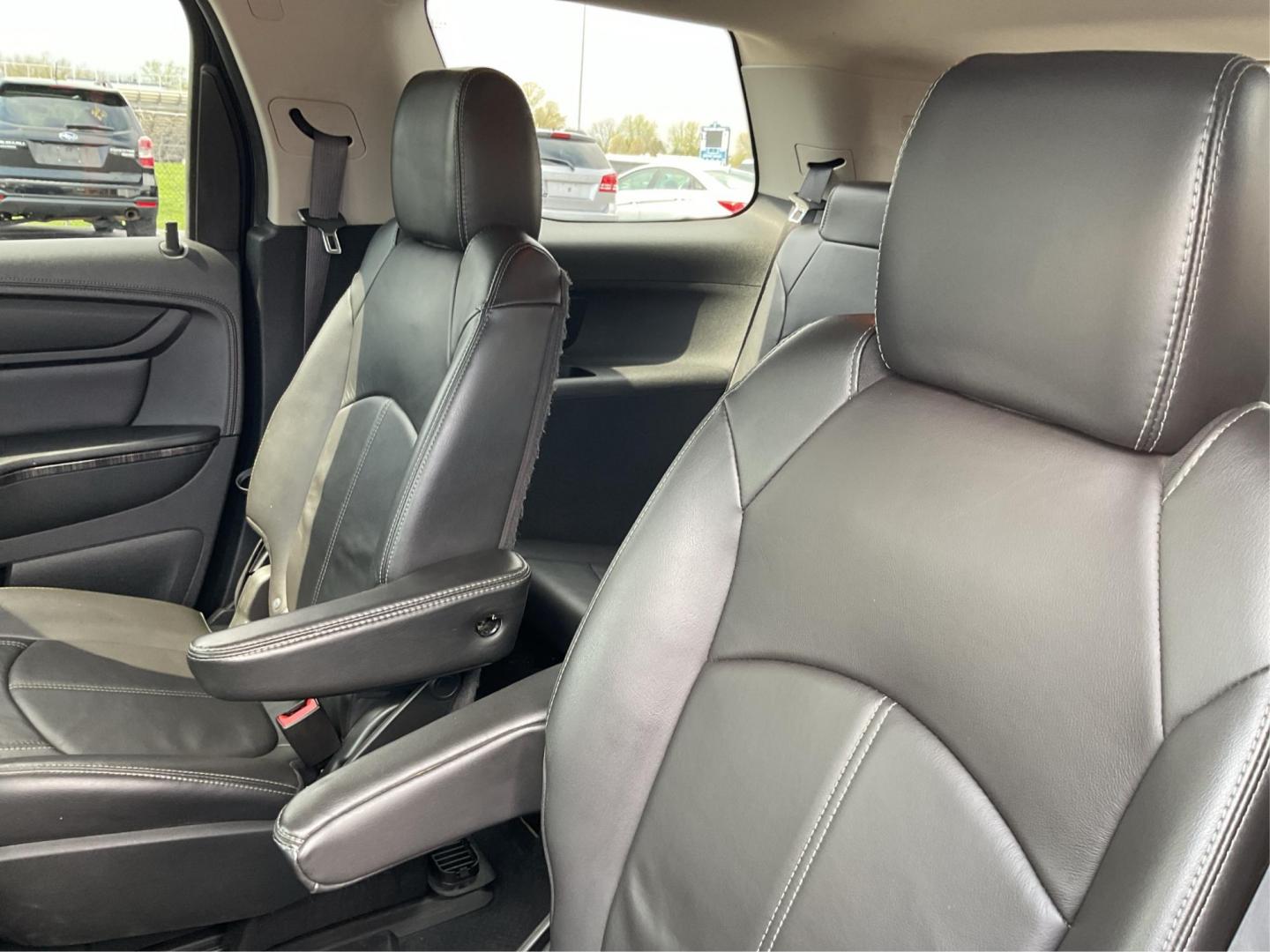 2015 GMC Acadia SLT-1 (1GKKVRKD8FJ) with an 3.6L V-6 gasoline direct injection engine, located at 8750 N County Rd 25A, Piqua, OH, 45356, (937) 908-9800, 40.164391, -84.232513 - Third Row - Photo#9