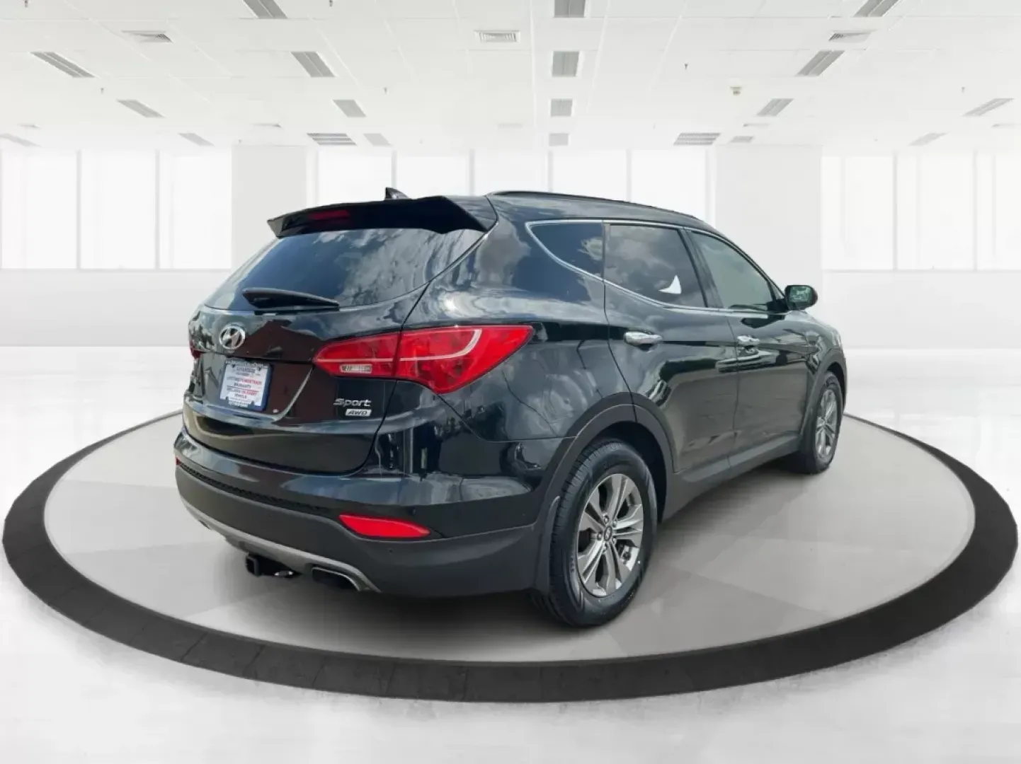 2015 Hyundai Santa Fe Sport 2.4L (5XYZUDLB2FG) with an Theta II 2.4L I-4 gasoline direct injection engine, located at 8750 N County Rd 25A, Piqua, OH, 45356, (937) 908-9800, 40.164391, -84.232513 - 2015 Hyundai Santa Fe Sport 2.4L - Photo#2