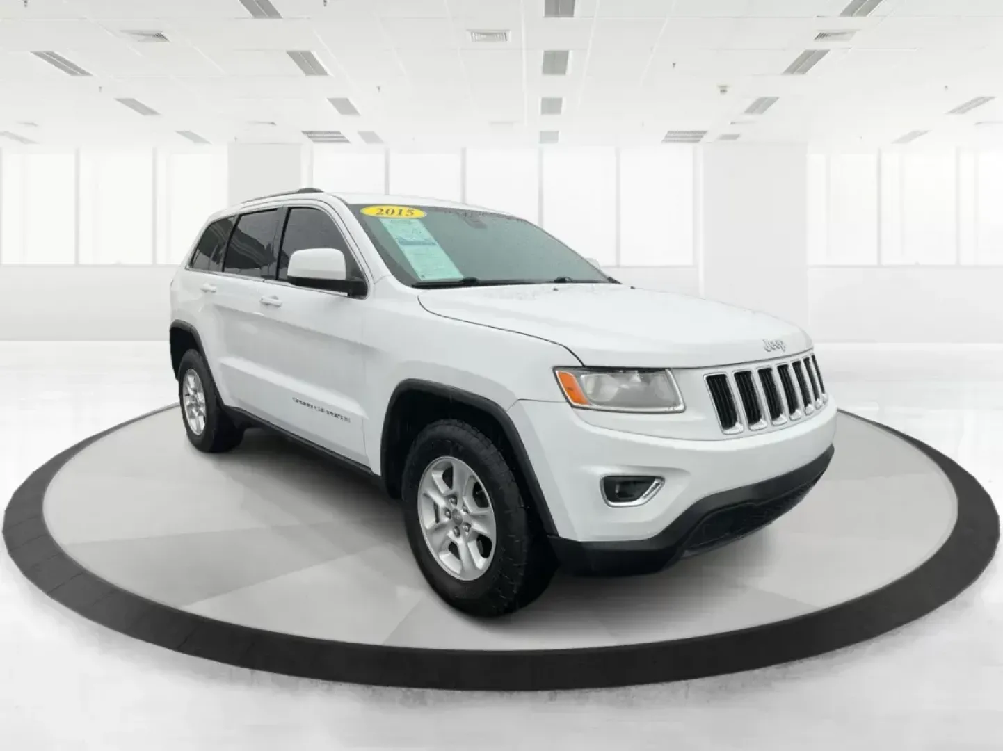 2015 Jeep Grand Cherokee Laredo (1C4RJFAG7FC) with an 3.6L V-6 DOHC engine, located at 8750 N County Rd 25A, Piqua, OH, 45356, (937) 908-9800, 40.164391, -84.232513 - 2015 Jeep Grand Cherokee Laredo - Photo#0