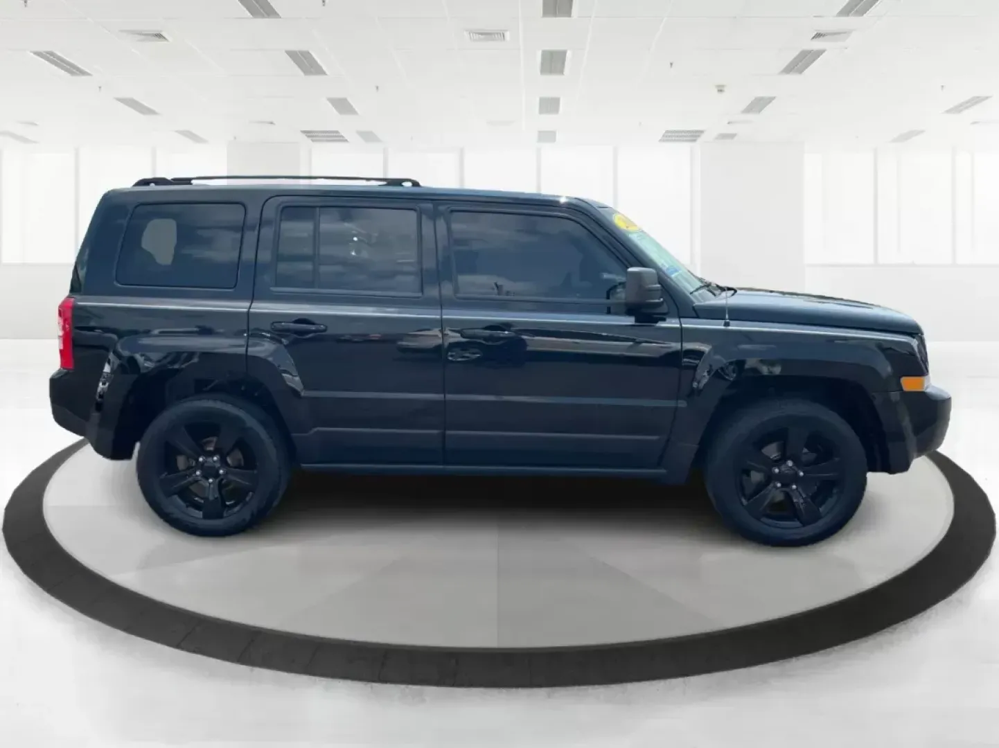 2015 Jeep Patriot Altitude Edition (1C4NJRBB1FD) with an 2.4L I-4 DOHC engine, located at 880 E. National Road, Vandalia, OH, 45377, (937) 908-9800, 39.891918, -84.183594 - 2015 Jeep Patriot Altitude Edition - Photo#1