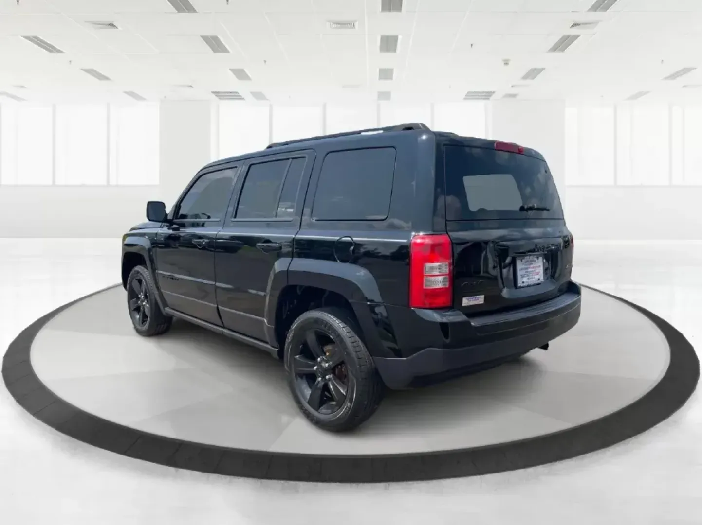 2015 Jeep Patriot Altitude Edition (1C4NJRBB1FD) with an 2.4L I-4 DOHC engine, located at 880 E. National Road, Vandalia, OH, 45377, (937) 908-9800, 39.891918, -84.183594 - 2015 Jeep Patriot Altitude Edition - Photo#4