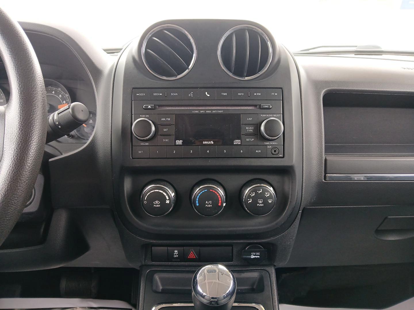 2015 Jeep Patriot Sport 4WD (1C4NJRBB7FD) with an 2.4L L4 DOHC 16V engine, located at 4508 South Dixie Dr, Moraine, OH, 45439, (937) 908-9800, 39.689976, -84.218452 - 2015 Jeep Patriot Sport 4WD - Photo#12