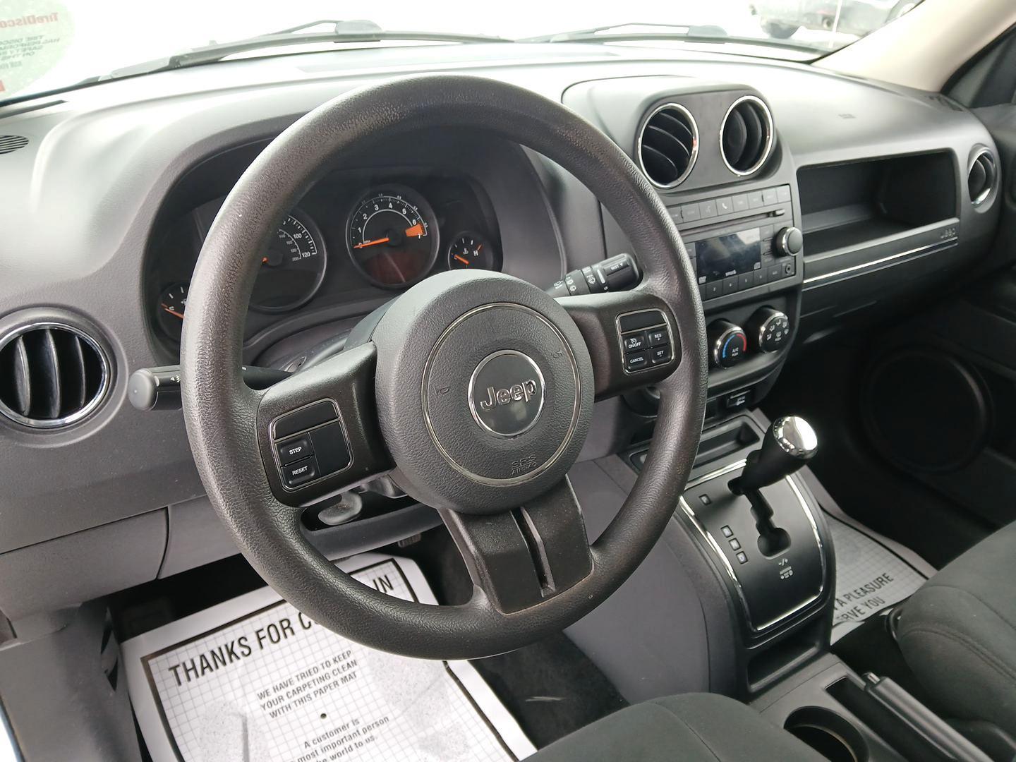 2015 Jeep Patriot Sport 4WD (1C4NJRBB7FD) with an 2.4L L4 DOHC 16V engine, located at 4508 South Dixie Dr, Moraine, OH, 45439, (937) 908-9800, 39.689976, -84.218452 - 2015 Jeep Patriot Sport 4WD - Photo#8