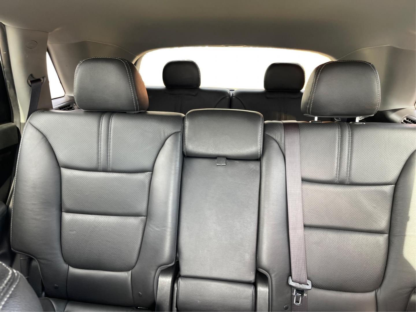 2015 Kia Sorento EX V6 (5XYKU4A74FG) with an Lambda II 3.3L V-6 gasoline direct injection engine, located at 8750 N County Rd 25A, Piqua, OH, 45356, (937) 908-9800, 40.164391, -84.232513 - 2015 Kia Sorento EX V6 - Photo#13