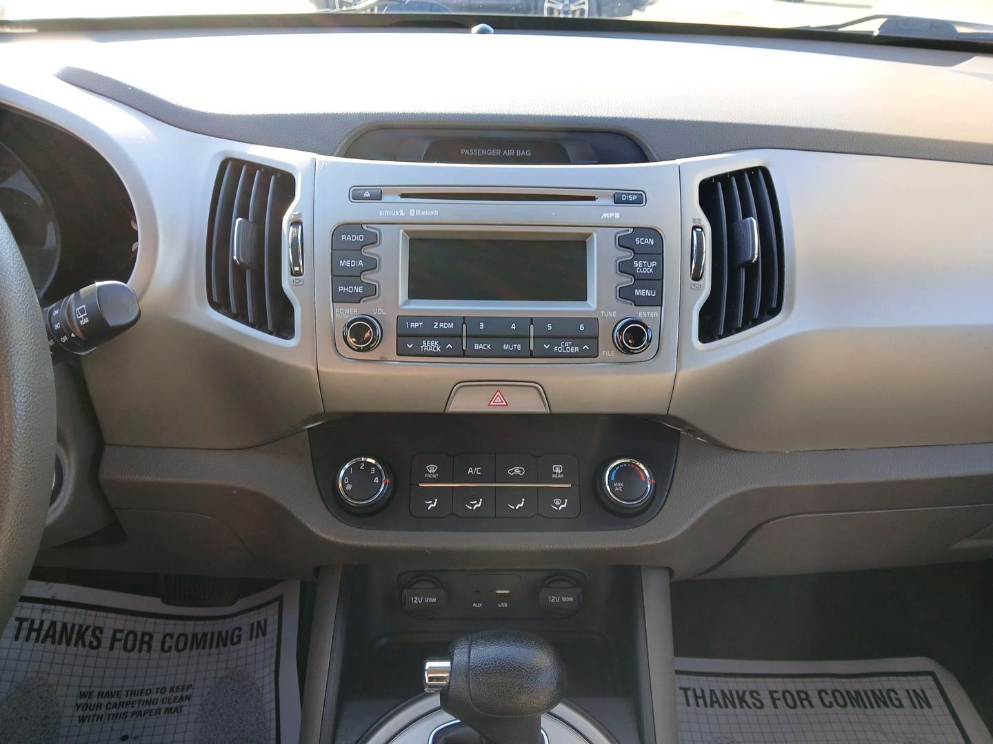 2015 Kia Sportage LX AWD (KNDPBCAC0F7) with an 2.4L V6 DOHC 24V engine, 6-Speed Automatic transmission, located at 401 Woodman Dr, Riverside, OH, 45431, (937) 908-9800, 39.760899, -84.123421 - 2015 Kia Sportage LX AWD - Photo#12