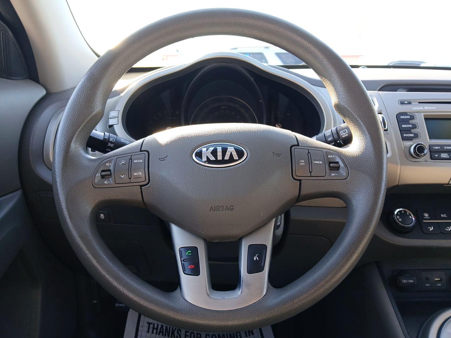 2015 Kia Sportage LX AWD (KNDPBCAC0F7) with an 2.4L V6 DOHC 24V engine, 6-Speed Automatic transmission, located at 401 Woodman Dr, Riverside, OH, 45431, (937) 908-9800, 39.760899, -84.123421 - 2015 Kia Sportage LX AWD - Photo#15