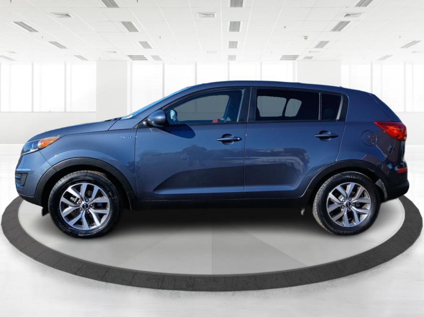 2015 Kia Sportage LX AWD (KNDPBCAC0F7) with an 2.4L V6 DOHC 24V engine, 6-Speed Automatic transmission, located at 401 Woodman Dr, Riverside, OH, 45431, (937) 908-9800, 39.760899, -84.123421 - 2015 Kia Sportage LX AWD - Photo#5