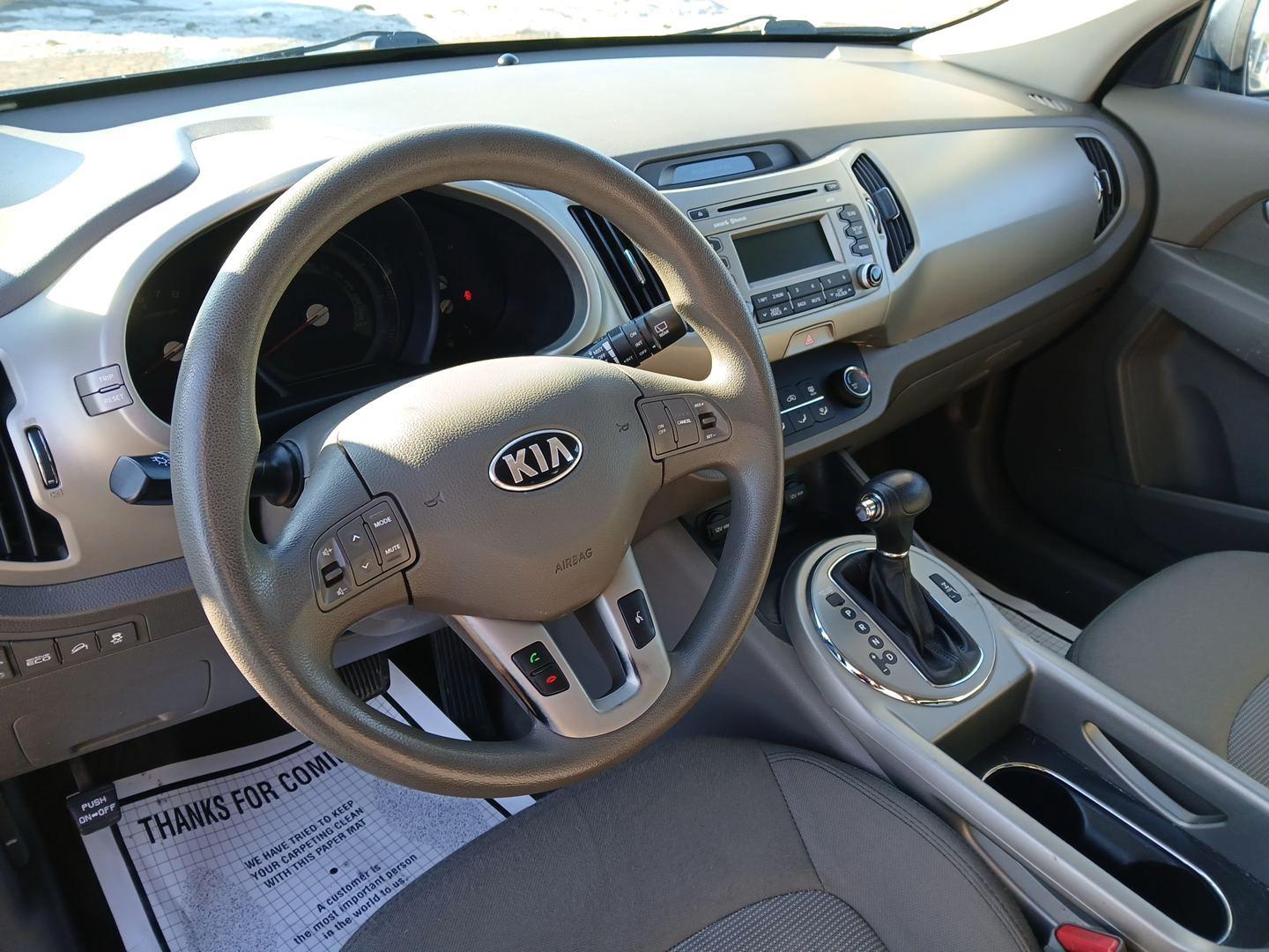 2015 Kia Sportage LX AWD (KNDPBCAC0F7) with an 2.4L V6 DOHC 24V engine, 6-Speed Automatic transmission, located at 401 Woodman Dr, Riverside, OH, 45431, (937) 908-9800, 39.760899, -84.123421 - 2015 Kia Sportage LX AWD - Photo#8