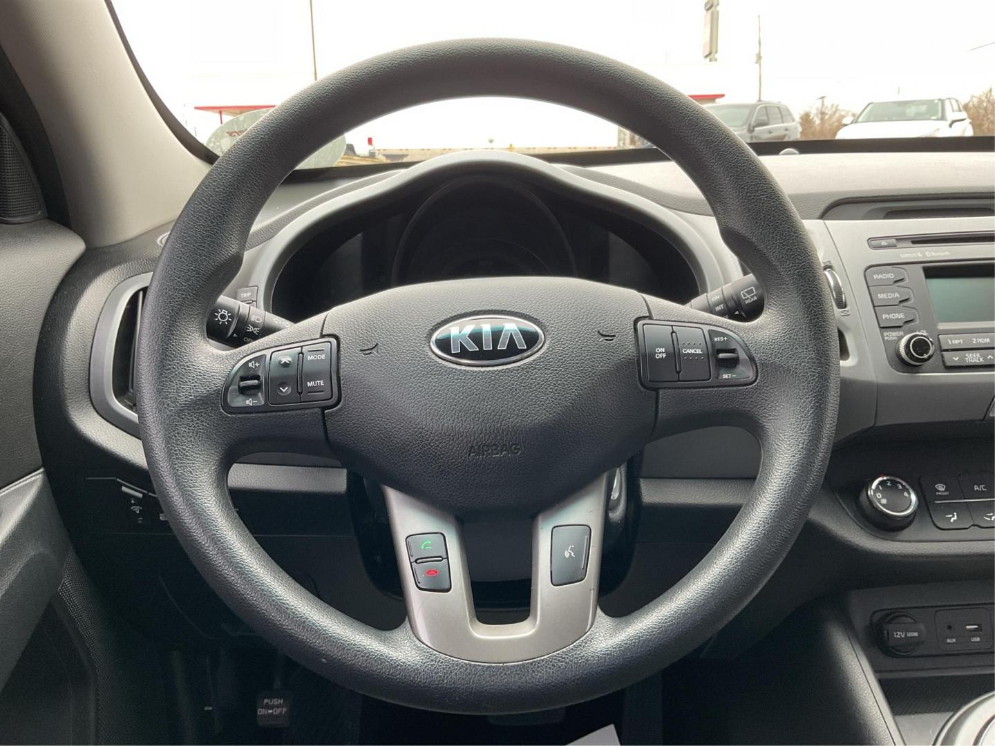 2015 Kia Sportage LX FWD (KNDPB3AC3F7) with an 2.4L V6 DOHC 24V engine, 6-Speed Automatic transmission, located at 1099 N County Rd 25A , Troy, OH, 45373, (937) 908-9800, 40.057079, -84.212883 - 2015 Kia Sportage LX FWD - Photo#15