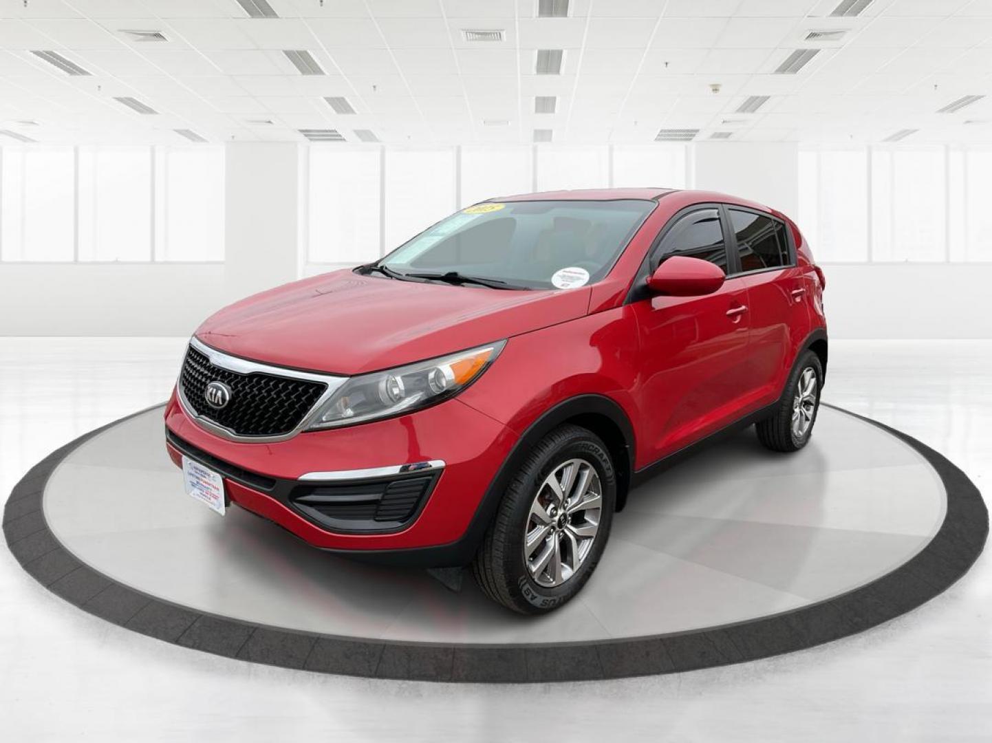 2015 Kia Sportage LX FWD (KNDPB3AC3F7) with an 2.4L V6 DOHC 24V engine, 6-Speed Automatic transmission, located at 1099 N County Rd 25A , Troy, OH, 45373, (937) 908-9800, 40.057079, -84.212883 - 2015 Kia Sportage LX FWD - Photo#7