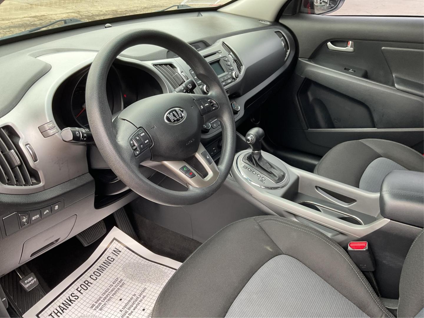 2015 Kia Sportage LX FWD (KNDPB3AC3F7) with an 2.4L V6 DOHC 24V engine, 6-Speed Automatic transmission, located at 1099 N County Rd 25A , Troy, OH, 45373, (937) 908-9800, 40.057079, -84.212883 - 2015 Kia Sportage LX FWD - Photo#8