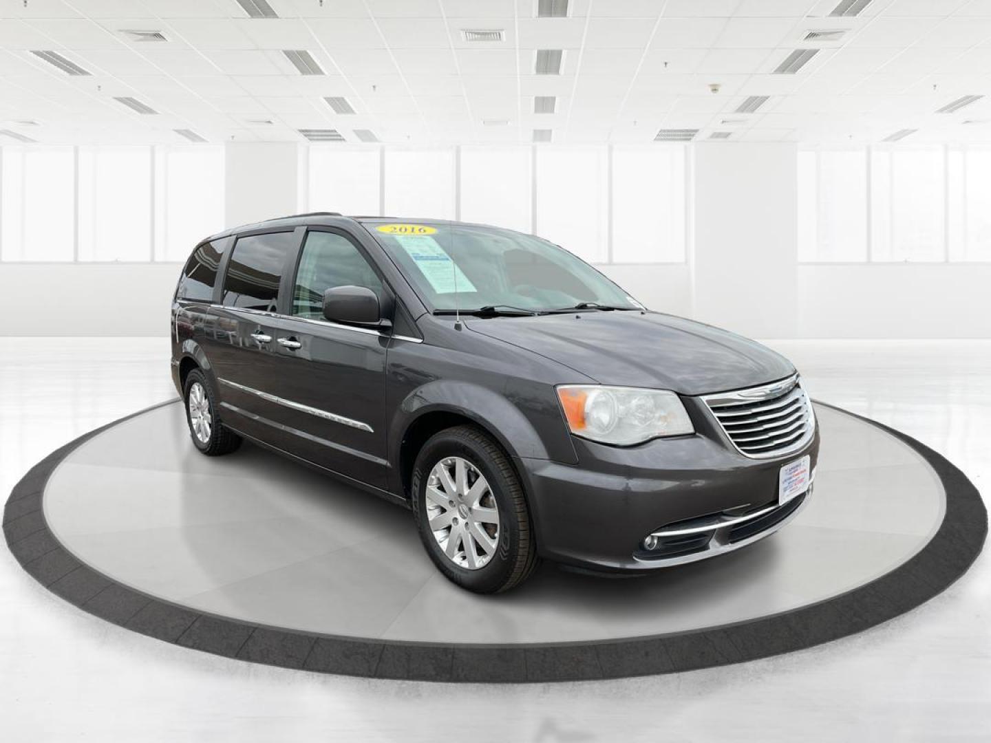 2016 Chrysler Town and Country Touring (2C4RC1BG4GR) with an 3.6L V6 DOHC 24V engine, 6-Speed Automatic transmission, located at 8750 N County Rd 25A, Piqua, OH, 45356, (937) 908-9800, 40.164391, -84.232513 - 2016 Chrysler Town and Country Touring - Photo#0