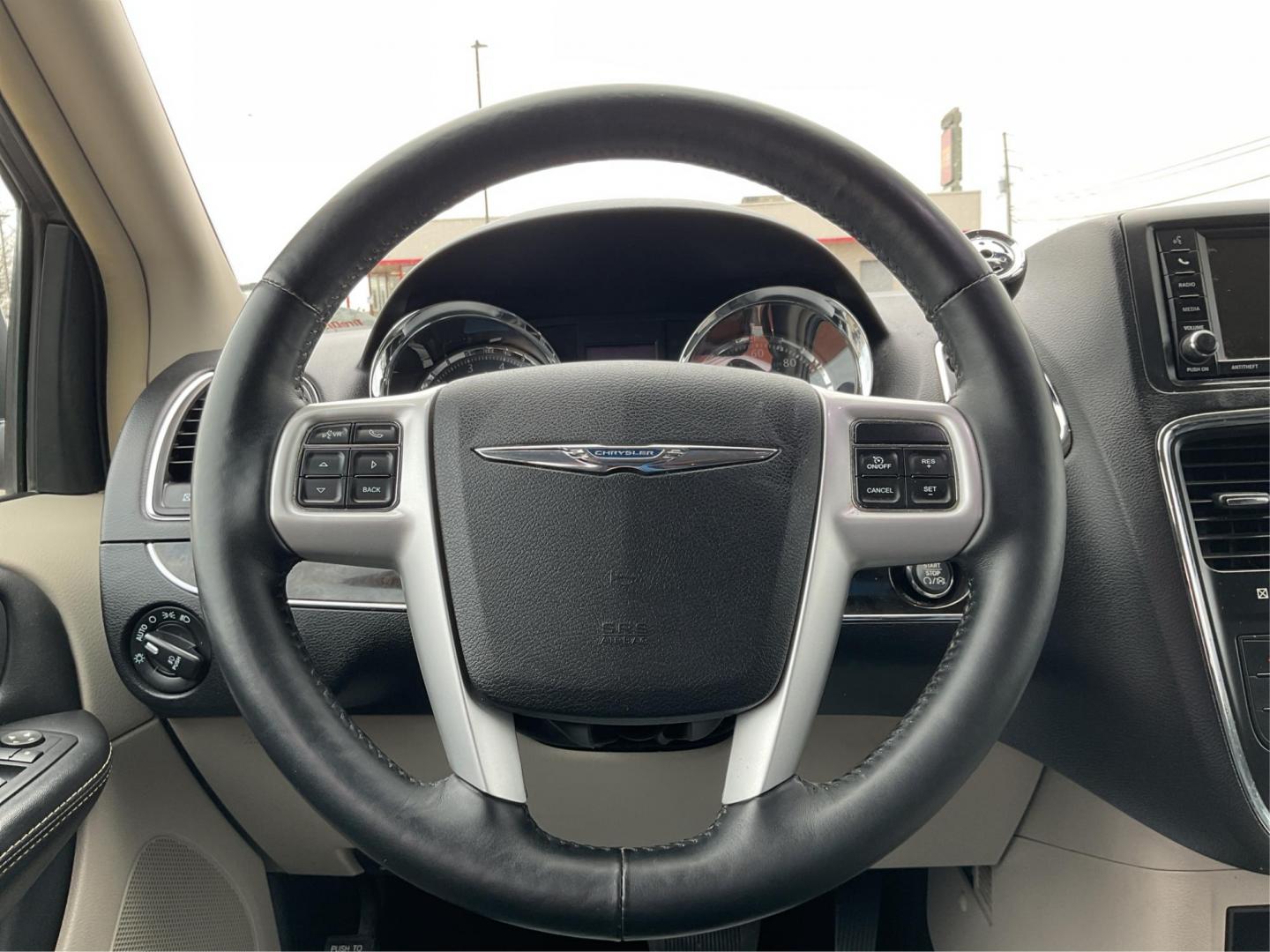 2016 Chrysler Town and Country Touring (2C4RC1BG4GR) with an 3.6L V6 DOHC 24V engine, 6-Speed Automatic transmission, located at 8750 N County Rd 25A, Piqua, OH, 45356, (937) 908-9800, 40.164391, -84.232513 - 2016 Chrysler Town and Country Touring - Photo#15