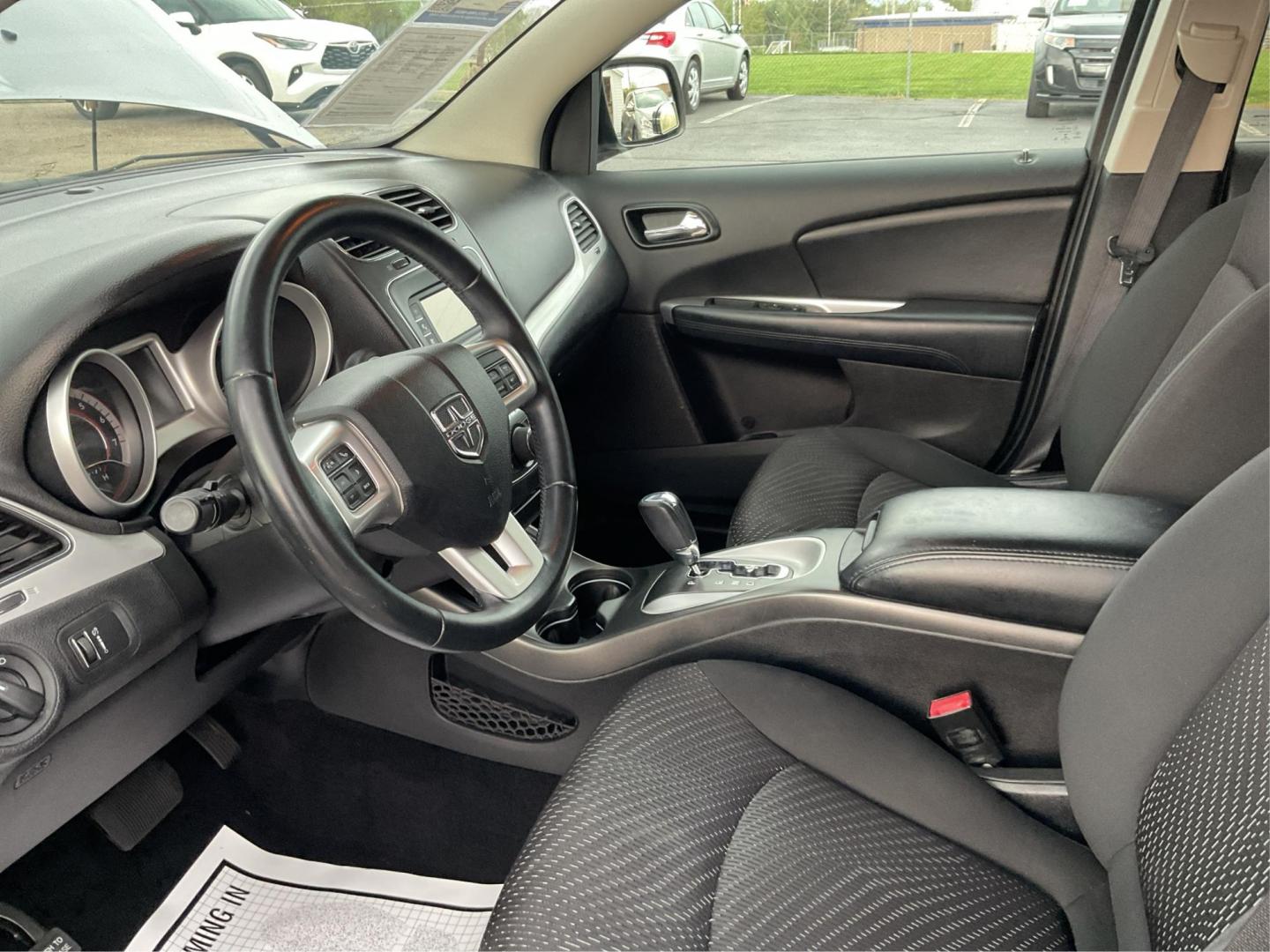 2016 Dodge Journey SE (3C4PDCAB7GT) with an Tigershark MultiAir 2.4L I-4 DOHC engine, located at 8750 N County Rd 25A, Piqua, OH, 45356, (937) 908-9800, 40.164391, -84.232513 - 2016 Dodge Journey SE - Photo#9