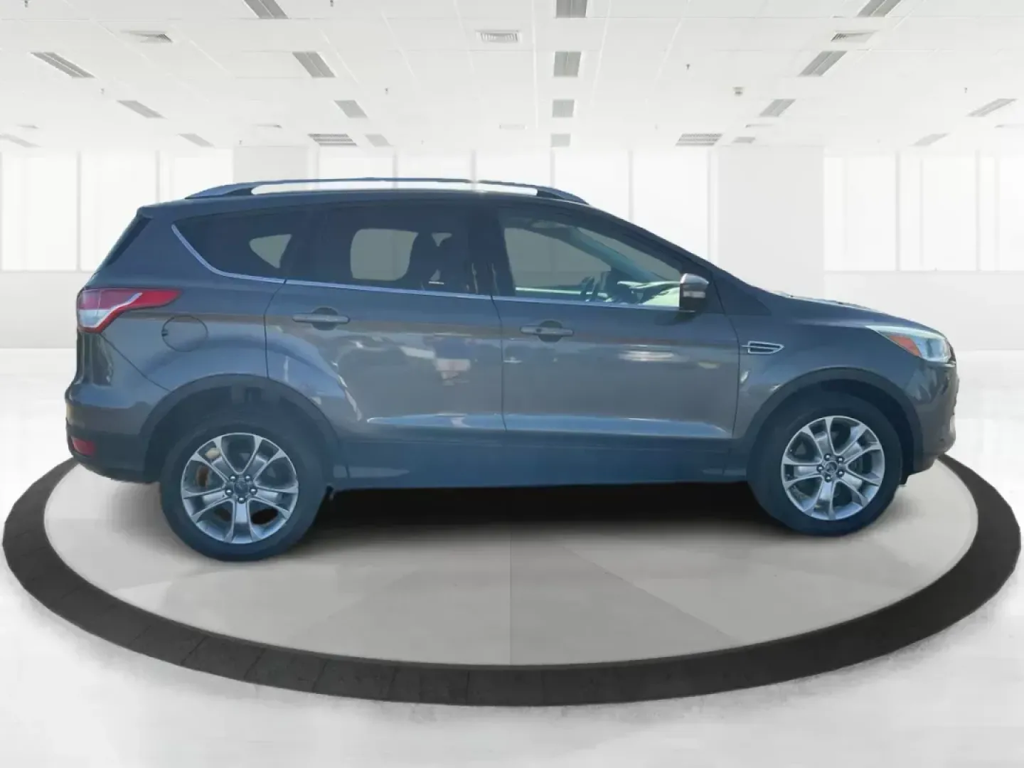 2016 Ford Escape Titanium (1FMCU9J92GU) with an EcoBoost 1.6L I-4 gasoline direct injection engine, located at 1184 Kauffman Ave, Fairborn, OH, 45324, (937) 908-9800, 39.807072, -84.030914 - 2016 Ford Escape Titanium - Photo#0